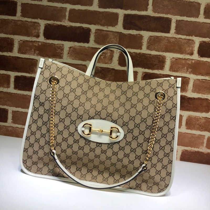 G*u*i shopping bags